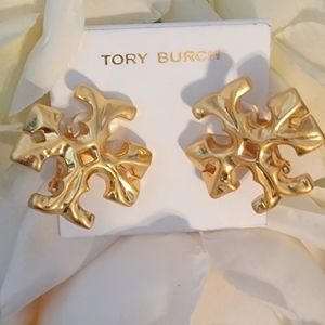 Tory Burch Big Roxanne clip earrings.